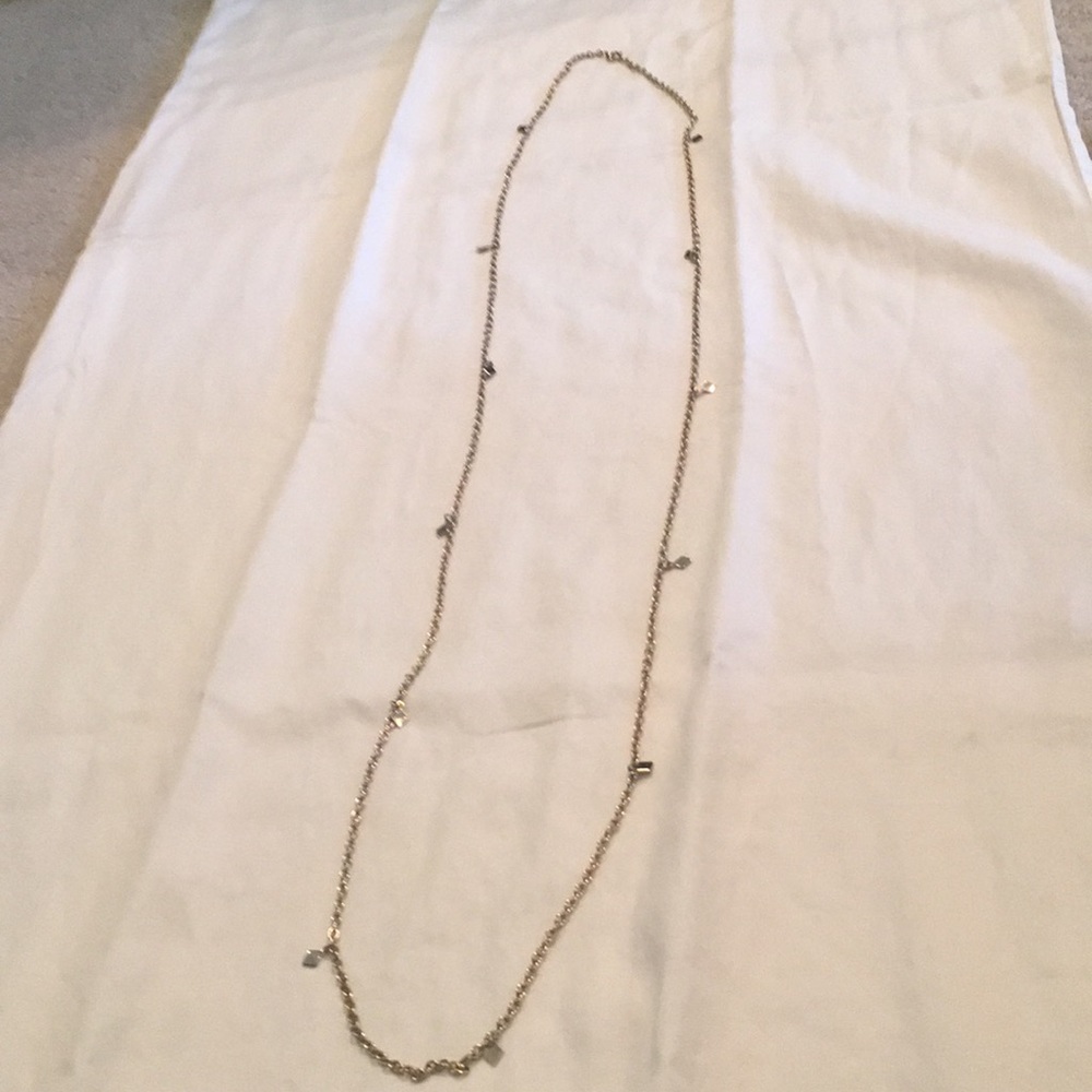 Long gold necklace
